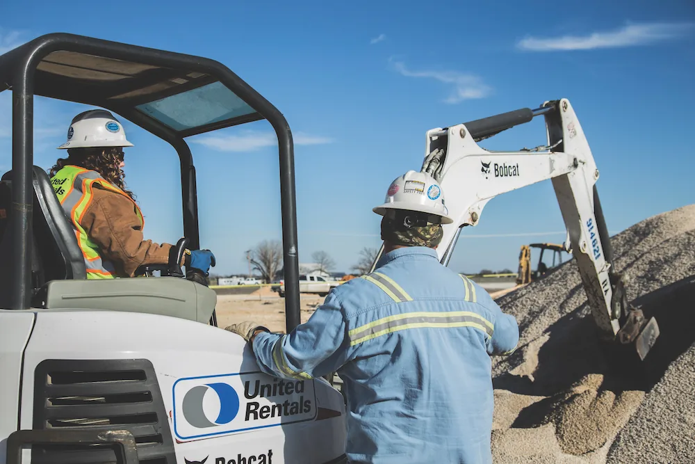 workers with excavator