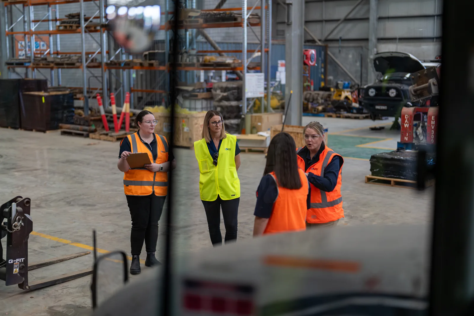workers safety de brief in yard factory