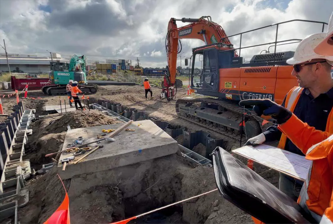 Engineer inspecting shoring installation onsite