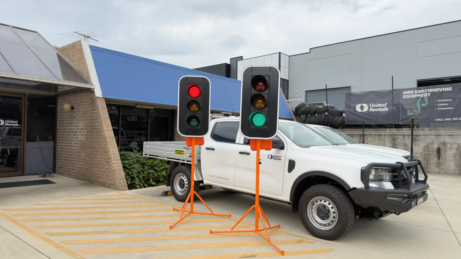 Trailer Mounted Traffic Lights - Tow trailer-mounted traffic light units packed in the equipment yard.